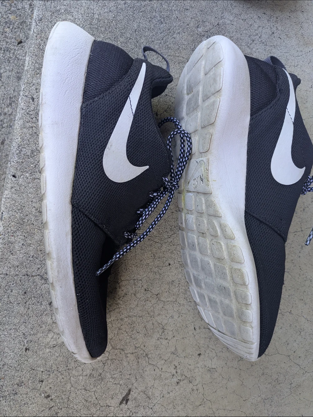 Nike Women's Black Knit Sneakers with White Sole